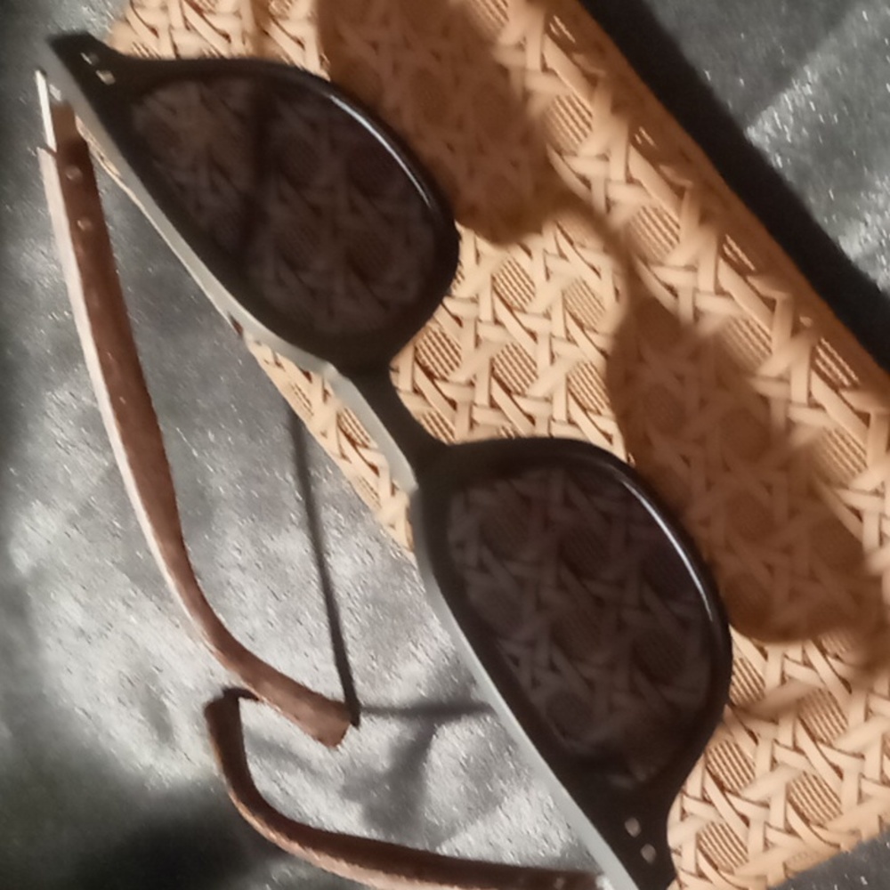 Mens wood grain sun glasses & Matching Case a gray lens with black frames.